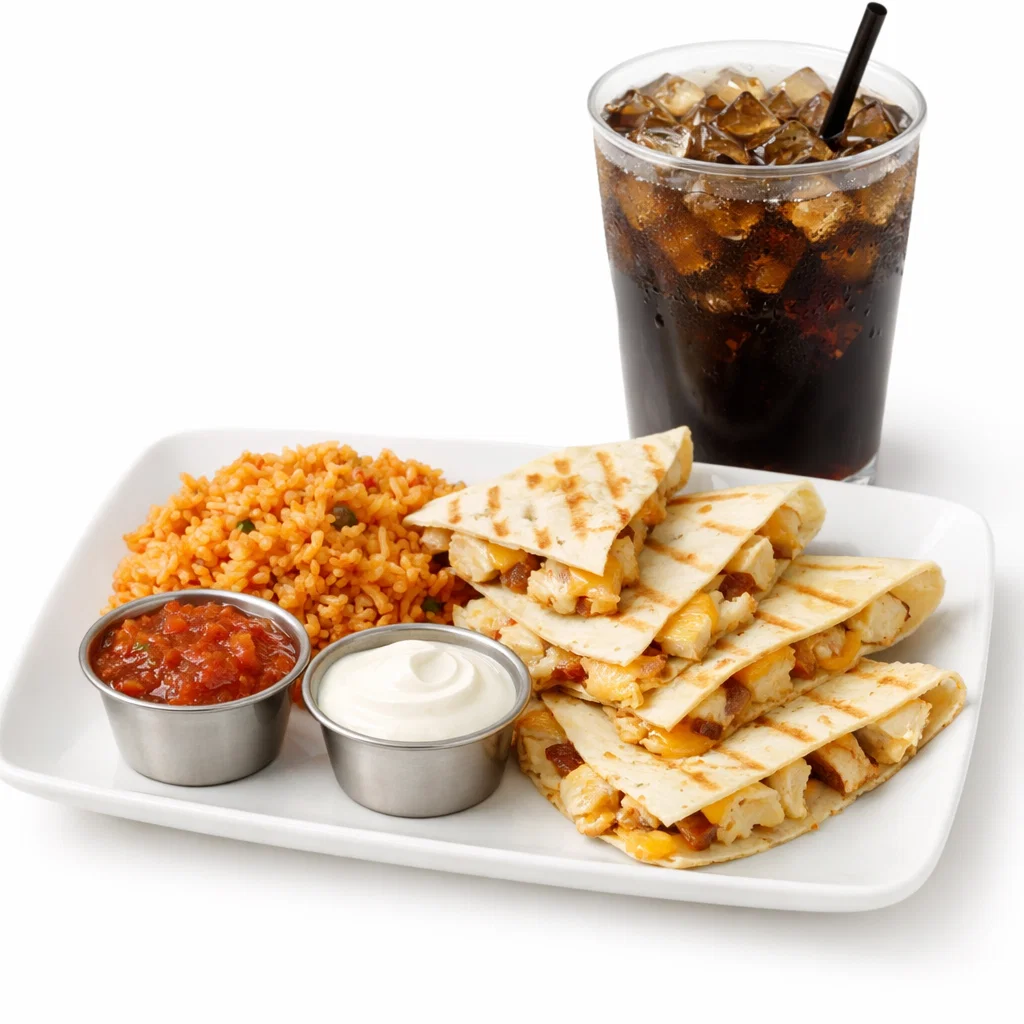 Chicken quesadilla tray with grilled chicken and cheese quesadilla, rice, dip, and drink on a white background