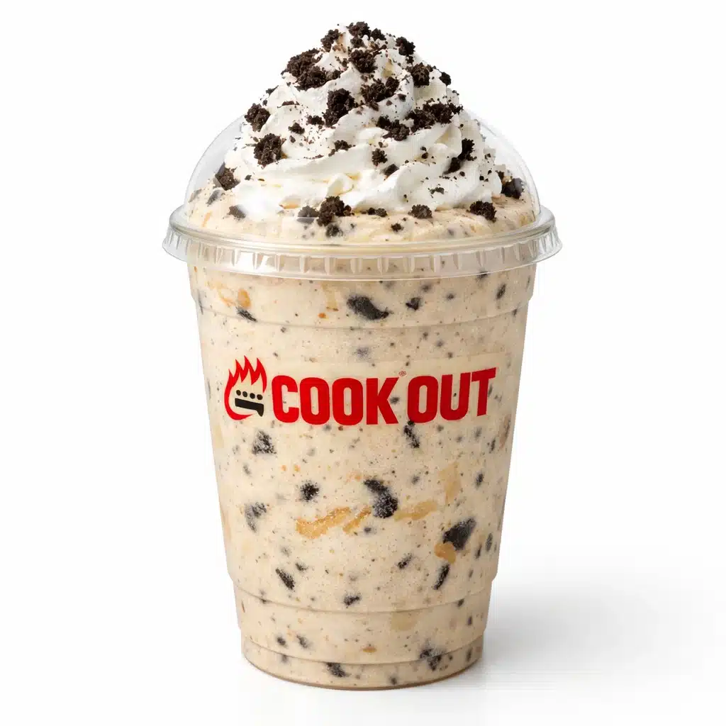 Oreo Peanut Butter Milkshake in Cookout dome cup with whipped cream