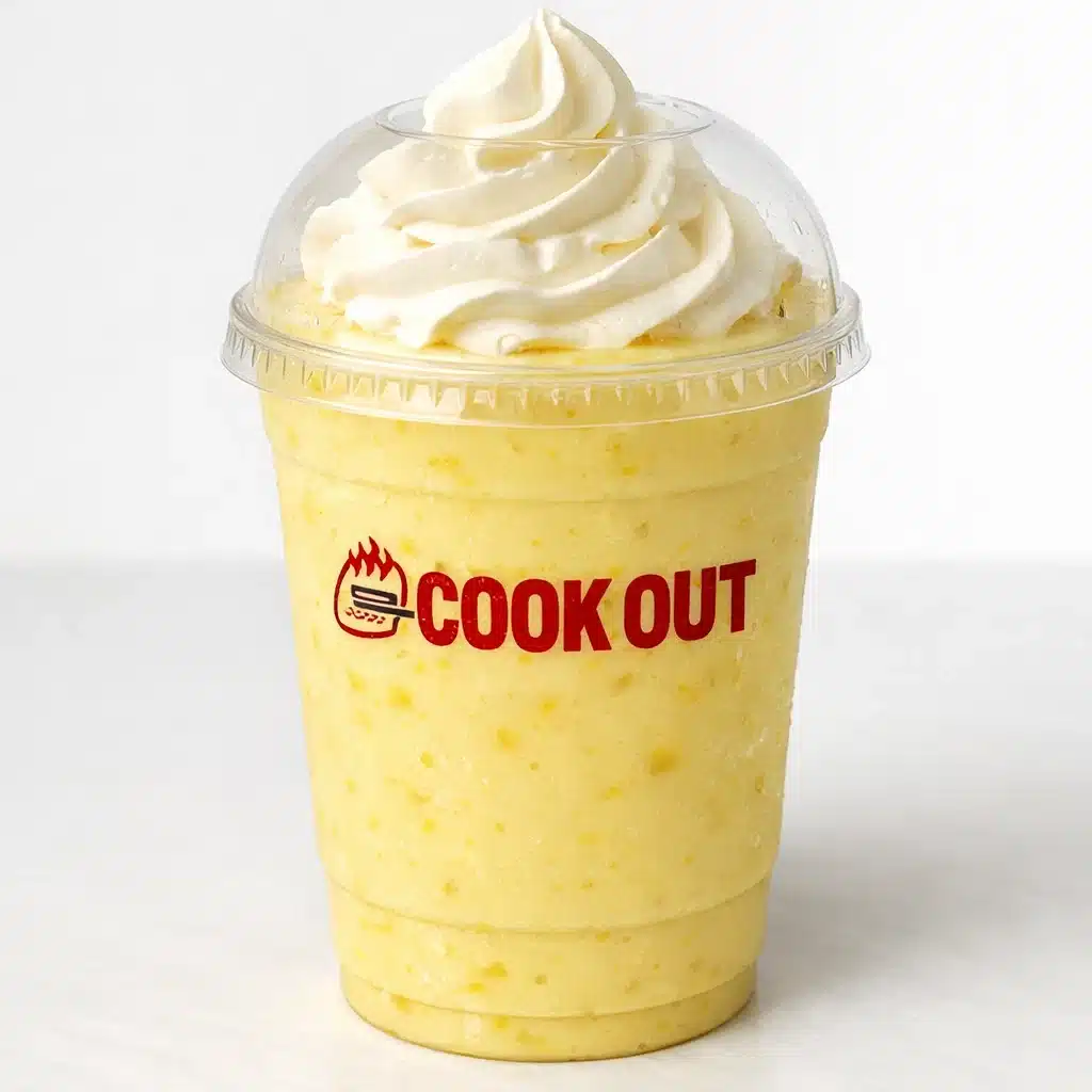 Pineapple Milkshake in Cookout dome cup with whipped cream